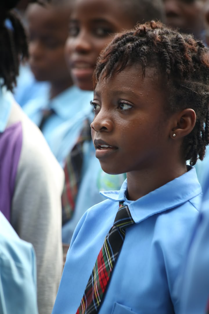 Student with hand on chest during the anthem
