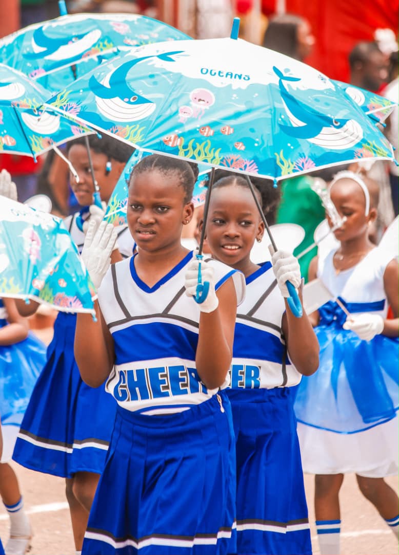 Cheer squad with ocean umbrellas