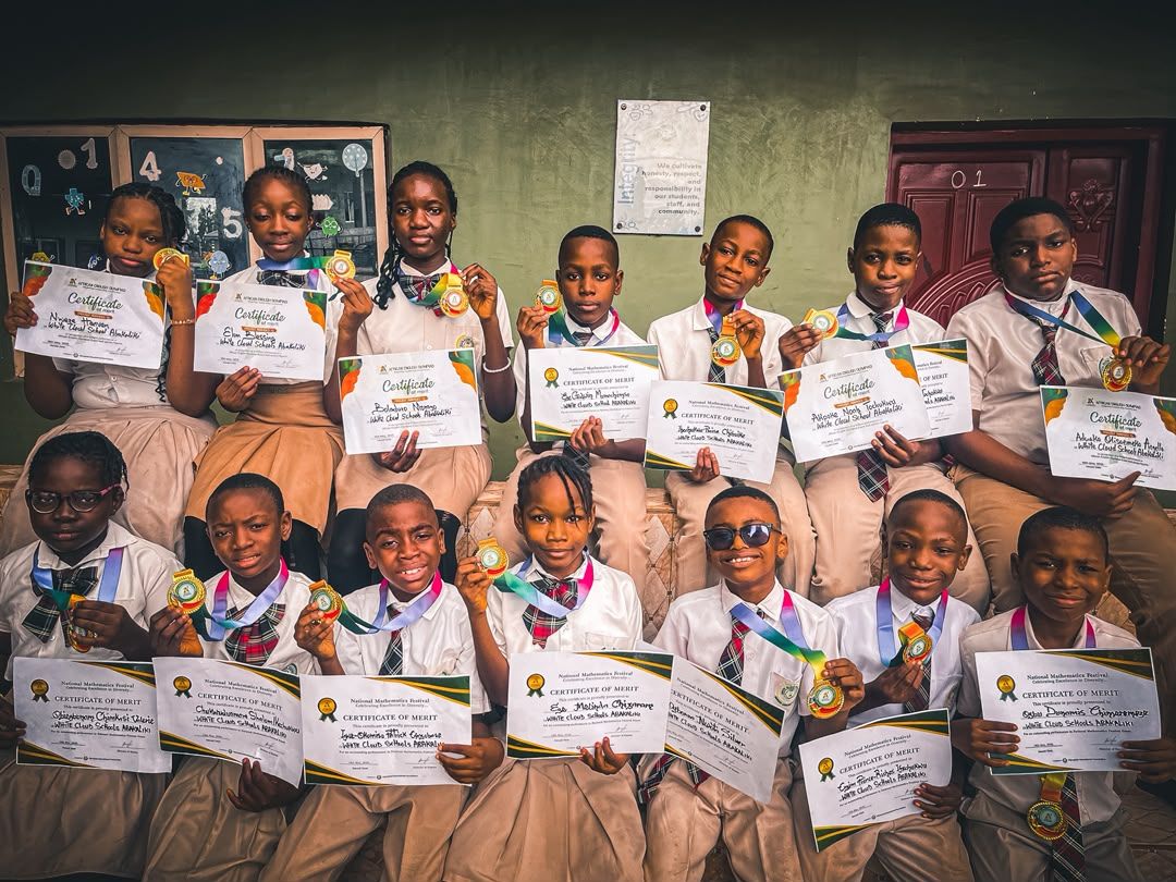 Pupils with medals and certificates